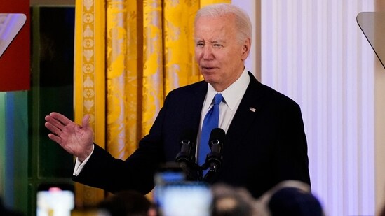 US President Joe Biden speaks during a Hanukkah reception (AFP)