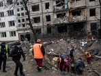 Russia-Ukraine War: Investigators look for fragments of a rocket inside a crater after a Russian rocket attack at a residential neighbourhood in Kyiv, Ukraine. Russia-Ukraine War: Investigators look for fragments of a rocket inside a crater after a Russian rocket attack at a residential neighbourhood in Kyiv, Ukraine.