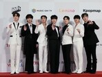 Members of South Korean K-Pop group ATEEZ pose as they arrive to attend The Fact Music Awards in Incheon, South Korea, Tuesday, Oct. 10, 2023. (AP Photo/Ahn Young-joon)