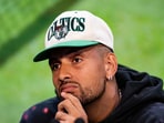 Australia's Nick Kyrgios listens during a pre-tournament press conference 
