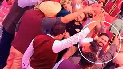 A video grab showing he accused, Lucky Sandhu, dancing at a wedding function in Hissowal village, Ludhiana. (HT Photo)