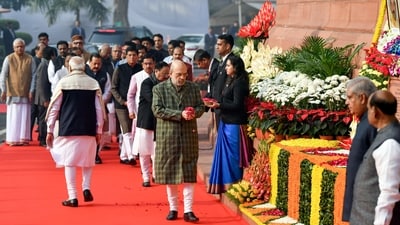 PM Modi leaves while Union Home Minister Amit Shah arrives to pay floral tribute to the fallen jawans at the Parliament House in New Delhi. (ANI) PM Modi leaves while Union Home Minister Amit Shah arrives to pay floral tribute to the fallen jawans at the Parliament House in New Delhi. (ANI)