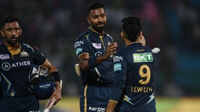 Gujarat Titans' Hardik Pandya (C) celebrates with teammates after winning the Indian Premier League (IPL) match vs Rajasthan Royals (AFP) Gujarat Titans' Hardik Pandya (C) celebrates with teammates after winning the Indian Premier League (IPL) match vs Rajasthan Royals (AFP)