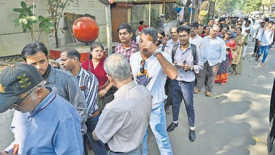 Mumbai, India - Dec. 11, 2023: People standing in an queue outside MAHADA office, Bandra, in Mumbai, India, on Monday, December 11, 2023. (Photo by Anshuman Poyrekar/ Hindustan Times) (Hindustan Times) Mumbai, India - Dec. 11, 2023: People standing in an queue outside MAHADA office, Bandra, in Mumbai, India, on Monday, December 11, 2023. (Photo by Anshuman Poyrekar/ Hindustan Times) (Hindustan Times)