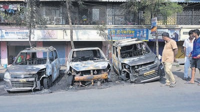 Mumbai, India - Dec 13, 2023 : Fire breaks out in three parked cars in which one person was burned and Hospitalized near the Trans Apartment at Andheri, in Mumbai, India, Wednesday, Dec 13, 2023. (Photo by Vijay Bate/HT Photo) Mumbai, India - Dec 13, 2023 : Fire breaks out in three parked cars in which one person was burned and Hospitalized near the Trans Apartment at Andheri, in Mumbai, India, Wednesday, Dec 13, 2023. (Photo by Vijay Bate/HT Photo)