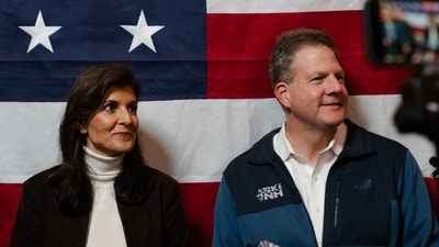 MANCHESTER, NEW HAMPSHIRE - DECEMBER 12: Republican Presidential Candidate Nikki Haley and New Hampshire Gov. Chris Sununu speak to members of the press after Sununu's endorsement of Haley during a Town hall event at McIntyre Ski Area on December 12, 2023 in Manchester, New Hampshire. (Getty Images via AFP) MANCHESTER, NEW HAMPSHIRE - DECEMBER 12: Republican Presidential Candidate Nikki Haley and New Hampshire Gov. Chris Sununu speak to members of the press after Sununu's endorsement of Haley during a Town hall event at McIntyre Ski Area on December 12, 2023 in Manchester, New Hampshire. (Getty Images via AFP)