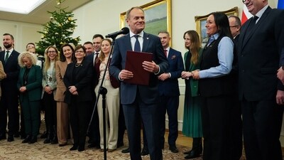 Newly appointed Polish Prime Minister Donald Tusk reacts after winning the vote of confidence for his government, in Parliament, in Warsaw. (Reuters)