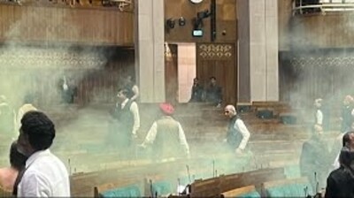 The protesters fired smoke from yellow canisters they carried with them inside Lok Sabha. The protesters fired smoke from yellow canisters they carried with them inside Lok Sabha.