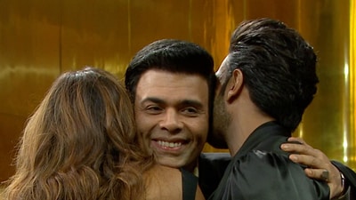 Karan Johar hugging Deepika Padukone and Ranveer Singh on Koffee with Karan Season 8 Karan Johar hugging Deepika Padukone and Ranveer Singh on Koffee with Karan Season 8