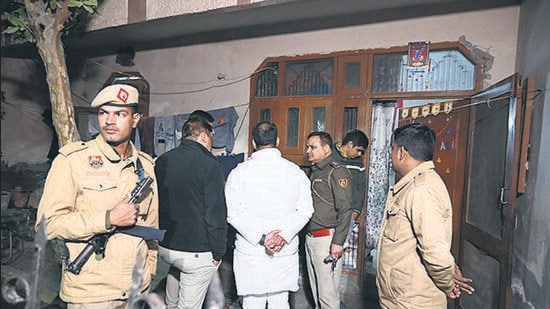 Gurugram police and a crime branch team outside the house where the accused stayed overnight. (HT/Parveen Kumar)