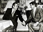 Raj Kapoor and Dharmendra at an event many years ago. Raj Kapoor and Dharmendra at an event many years ago.