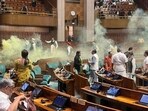 The intruders sprayed some yellow gas in a major security breach in the Lok Sabha. The intruders sprayed some yellow gas in a major security breach in the Lok Sabha.