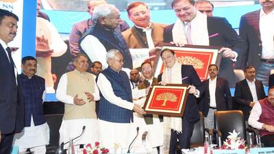 Bihar CM Nitish Kumar honours director of Adani Enterprises, Pranav Adani, at the Bihar Business Connect 2023 in Patna on Thursday. (Santosh Kumar/HT) Bihar CM Nitish Kumar honours director of Adani Enterprises, Pranav Adani, at the Bihar Business Connect 2023 in Patna on Thursday. (Santosh Kumar/HT)
