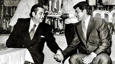 Raj Kapoor and Dharmendra at an event many years ago. Raj Kapoor and Dharmendra at an event many years ago.
