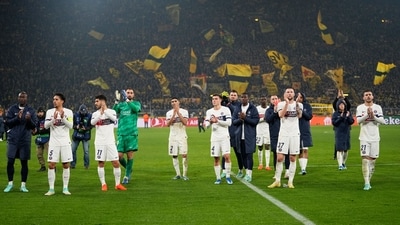 PSG's team players applaud after the Champions League Group F soccer match between Borussia Dortmund and Paris Saint-Germain at the Signal Iduna Park in Dortmund. (AP)