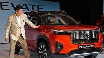 Takuya Tsumura, the President and Chief Executive Officer of Honda Cars India Ltd. gestures during the world premier launch of the new Honda Elevate SUV in New Delhi on June 6, 2023. ( / AFP) Takuya Tsumura, the President and Chief Executive Officer of Honda Cars India Ltd. gestures during the world premier launch of the new Honda Elevate SUV in New Delhi on June 6, 2023. ( / AFP)