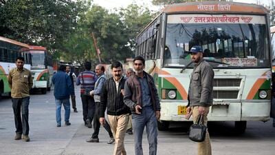 Over 90% of UPSRTC drivers are hired on contract and are paid ₹2.33 per km and no benefits. They drive nearly 500km daily to earn more money, said bus drivers at Noida depot. (Sunil Ghosh/HT Photo) Over 90% of UPSRTC drivers are hired on contract and are paid ₹2.33 per km and no benefits. They drive nearly 500km daily to earn more money, said bus drivers at Noida depot. (Sunil Ghosh/HT Photo)