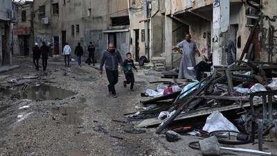 Palestinians inspect the damage following a three-day incursion by the Israeli army on the Jenin camp in the occupied West Bank bank city of Jenin, (AFP) Palestinians inspect the damage following a three-day incursion by the Israeli army on the Jenin camp in the occupied West Bank bank city of Jenin, (AFP)