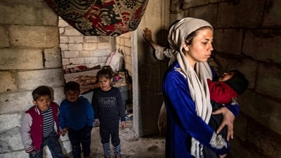 Displaced Syrians living in war-damaged buildings, are pictured in Syria's rebel-held northern city of Raqa on March 1, amid fears that the already fragile dwellings will not withstand an earthquake. (AFP) Displaced Syrians living in war-damaged buildings, are pictured in Syria's rebel-held northern city of Raqa on March 1, amid fears that the already fragile dwellings will not withstand an earthquake. (AFP)