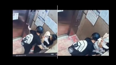 Man protects woman and her baby while a lift malfunctioned. Man protects woman and her baby while a lift malfunctioned.