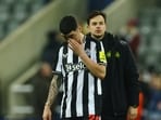 Newcastle United's Miguel Almiron looks dejected after their Champions League exit.