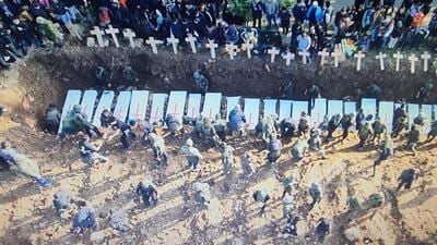 A view of the mass burial of 19 victims of Manipur’s ethnic conflict that at Phaijang village in Kangpokpi district on Friday (HT Photo/Sourced) A view of the mass burial of 19 victims of Manipur’s ethnic conflict that at Phaijang village in Kangpokpi district on Friday (HT Photo/Sourced)