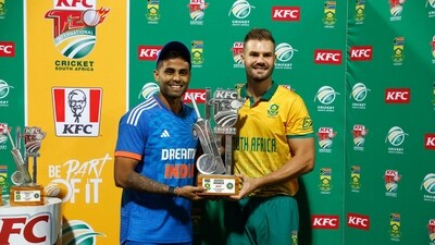 India's Suryakumar Yadav (L) and South Africa's Aiden Markram (R) hold the series winner trophy after India and South africa ended in a draw after the T20 cricket matches between South Africa and India at the Wanderers Stadium in Johannesburg on December 14, 2023. (Photo by PHILL MAGAKOE / AFP) (AFP) India's Suryakumar Yadav (L) and South Africa's Aiden Markram (R) hold the series winner trophy after India and South africa ended in a draw after the T20 cricket matches between South Africa and India at the Wanderers Stadium in Johannesburg on December 14, 2023. (Photo by PHILL MAGAKOE / AFP) (AFP)