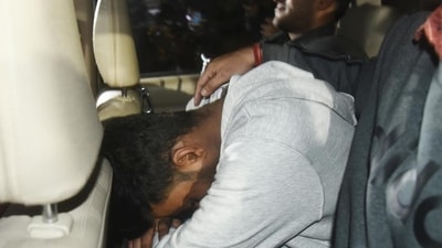 One of the accused arrested in the Parliament security breach case being produced in a Delhi court on Thursday. (HT PHOTO)