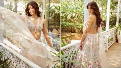 Shanaya accessorised the ensemble with minimal jewels, including a choker necklace decked in multi-coloured gemstones and flower-shaped silver earrings. Centre-parted open locks styled with dreamy beach waves gave the finishing touch. (Instagram) Shanaya accessorised the ensemble with minimal jewels, including a choker necklace decked in multi-coloured gemstones and flower-shaped silver earrings. Centre-parted open locks styled with dreamy beach waves gave the finishing touch. (Instagram)