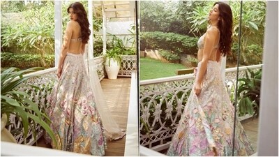 Shanaya shared the images with the caption, "Caught in a daydream." Celebrity stylist Aastha Sharma styled Shanaya in the lehenga set. It is an ivory ensemble decked in multi-coloured floral embroidery and features a lehenga skirt, statement blouse, and net dupatta. Read our download on it below. (Instagram) Shanaya shared the images with the caption, "Caught in a daydream." Celebrity stylist Aastha Sharma styled Shanaya in the lehenga set. It is an ivory ensemble decked in multi-coloured floral embroidery and features a lehenga skirt, statement blouse, and net dupatta. Read our download on it below. (Instagram)
