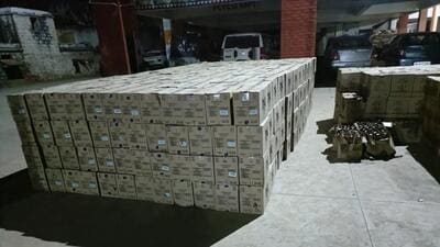 The Rewari policeseized a truck smuggling more than 800 cartons (9,708 bottles) of IMFL in Nuh on Thursday night; however, the truck driver managed to flee the scene. (HT Photo) The Rewari policeseized a truck smuggling more than 800 cartons (9,708 bottles) of IMFL in Nuh on Thursday night; however, the truck driver managed to flee the scene. (HT Photo)