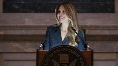 Former US First Lady Melania Trump speaks during a Naturalization Ceremony at the National Archives building in Washington, DC on December 15, 2023. Melania Trump made a rare public appearance on Friday to deliver a speech at the naturalization ceremony as 25 immigrants were sworn in as US citizens. (Photo by SAUL LOEB / AFP) (AFP) Former US First Lady Melania Trump speaks during a Naturalization Ceremony at the National Archives building in Washington, DC on December 15, 2023. Melania Trump made a rare public appearance on Friday to deliver a speech at the naturalization ceremony as 25 immigrants were sworn in as US citizens. (Photo by SAUL LOEB / AFP) (AFP)