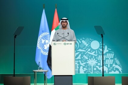 United Arab Emirates Minister of Industry and Advanced Technology and COP28 President Sultan Ahmed Al Jaber addresses the plenary, after a draft of a negotiation deal was released, at the United Nations Climate Change Conference COP28 in Dubai on December 13. (Reuters)