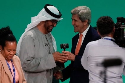 COP28 President Sultan al-Jaber and John Kerry, US Special Presidential Envoy for Climate, speak at the end of the COP28 UN Climate Summit on December 13. (AP) COP28 President Sultan al-Jaber and John Kerry, US Special Presidential Envoy for Climate, speak at the end of the COP28 UN Climate Summit on December 13. (AP)