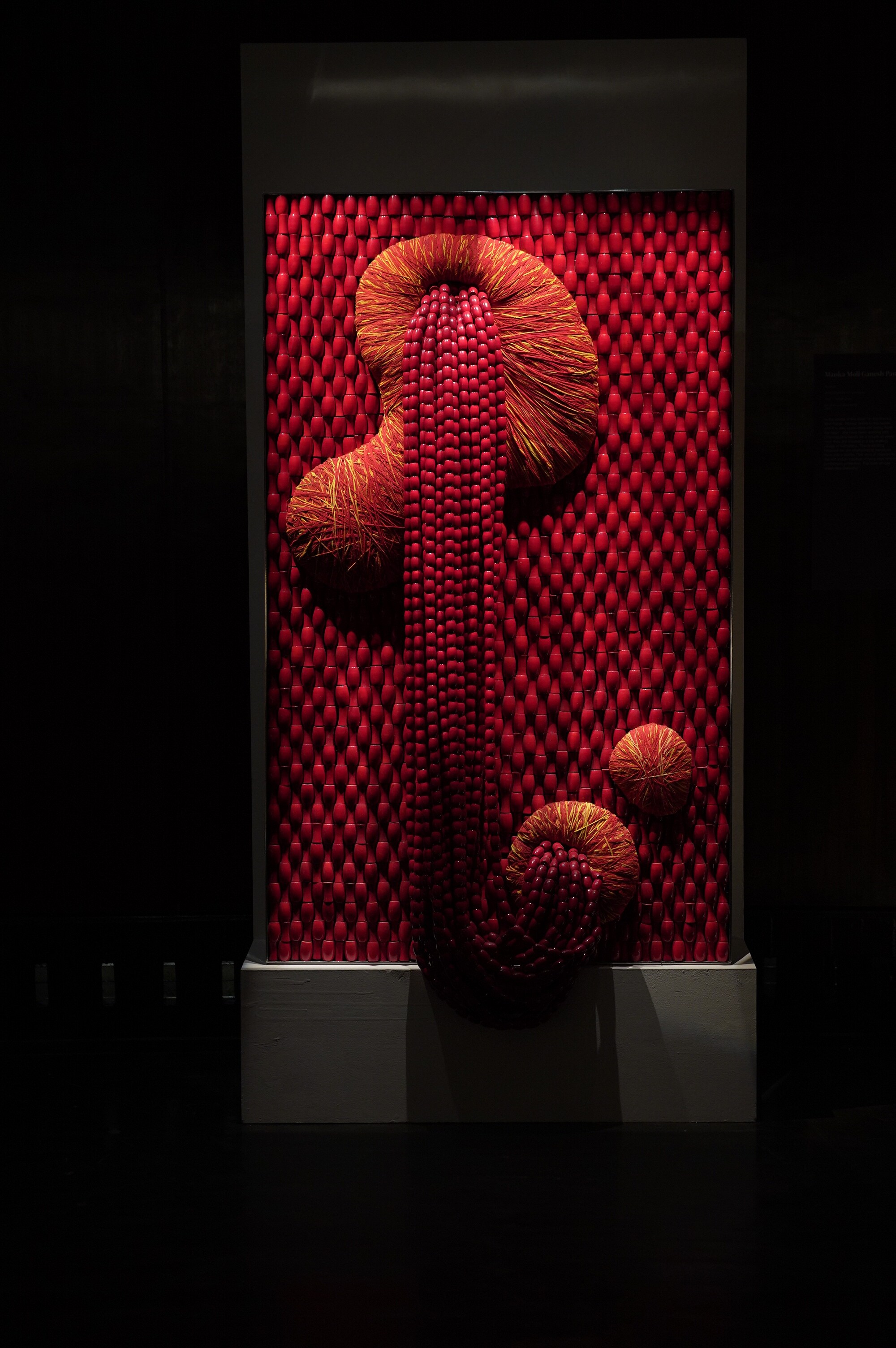 The wall hanging Manka Moli Ganesh by Ashiesh Shah is part of the Sutr Santati exhibition that seeks to answer the question: What else can textiles be? This work uses the sacred Hindu thread tied around the wrist, to create a form of Ganesha. The wall hanging Manka Moli Ganesh by Ashiesh Shah is part of the Sutr Santati exhibition that seeks to answer the question: What else can textiles be? This work uses the sacred Hindu thread tied around the wrist, to create a form of Ganesha.