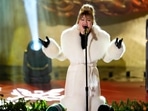 Kelly Clarkson performs at the Rockefeller Center Christmas tree lighting ceremony on Wednesday, Nov. 29, 2023, in New York. (Photo by Charles Sykes/Invision/AP) Kelly Clarkson performs at the Rockefeller Center Christmas tree lighting ceremony on Wednesday, Nov. 29, 2023, in New York. (Photo by Charles Sykes/Invision/AP)
