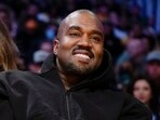 FILE -Outrage erupts as Kanye West sports Klan-like hood at 'Vultures Rave' album launch (AP Photo/Ashley Landis, File)