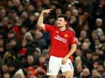 Manchester United's Harry Maguire reacts after sustaining an injury