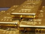 Gold bars are displayed in this file photo. Gold bars are displayed in this file photo.