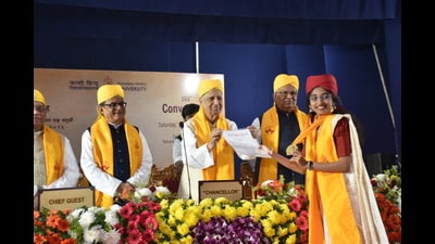 Graduating student Bhadra Priya from Kerala receives a Chancellor’s medal during the 103rd convocation of Banaras Hindu University, in Varanasi on Saturday. (Rajesh Kumar/HT) Graduating student Bhadra Priya from Kerala receives a Chancellor’s medal during the 103rd convocation of Banaras Hindu University, in Varanasi on Saturday. (Rajesh Kumar/HT)