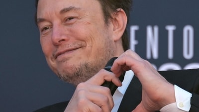 Elon Musk In Italy: X (formerly Twitter) CEO Elon Musk makes a heart with his hands during the Atreju political meeting. (AFP) Elon Musk In Italy: X (formerly Twitter) CEO Elon Musk makes a heart with his hands during the Atreju political meeting. (AFP)