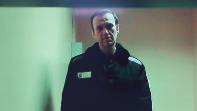 FILE PHOTO: Russian opposition leader Alexei Navalny is seen on a screen via video link from a penal colony in the Vladimir Region during a hearing at the Basmanny district court in Moscow, Russia April 26, 2023. REUTERS/Yulia Morozova/File Photo (REUTERS)