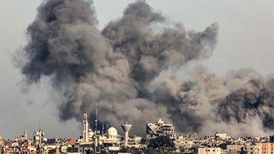 Israel-Hamas War: Smoke billows from Israeli bombardment over Khan Yunis from Rafah in the southern Gaza Strip. (AFP) Israel-Hamas War: Smoke billows from Israeli bombardment over Khan Yunis from Rafah in the southern Gaza Strip. (AFP)