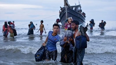 Ethnic Rohingya disembark from their boat upon landing in Ulee Madon, North Aceh, Indonesia, Thursday, Nov. 16, 2023. (AP) Ethnic Rohingya disembark from their boat upon landing in Ulee Madon, North Aceh, Indonesia, Thursday, Nov. 16, 2023. (AP)