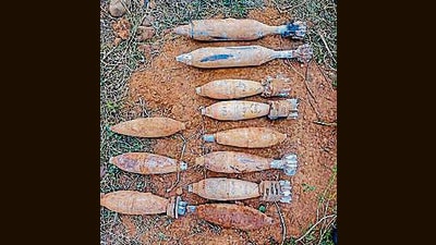 Rusted mortar shells found during excavation in a field in border areas of Jammu on Saturday. (PTI)