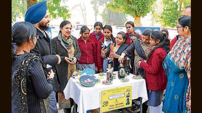 Students showcasing their art projects to parents during the mega PTM event organised at a government school in Ludhiana. (HT) Students showcasing their art projects to parents during the mega PTM event organised at a government school in Ludhiana. (HT)