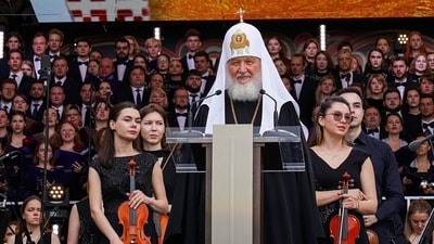 In this handout photo released by Russian Orthodox Church Press Service, Patriarch Kirill, center, speaks prior to a concert celebrating the Day of Slavic Literature and Culture in Red Square in Moscow. (AP) In this handout photo released by Russian Orthodox Church Press Service, Patriarch Kirill, center, speaks prior to a concert celebrating the Day of Slavic Literature and Culture in Red Square in Moscow. (AP)