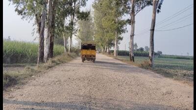 Villagers in Gheer said the condition of the road worsened after the Yamuna covered the road for several days during the monsoon. (HT Photo) Villagers in Gheer said the condition of the road worsened after the Yamuna covered the road for several days during the monsoon. (HT Photo)
