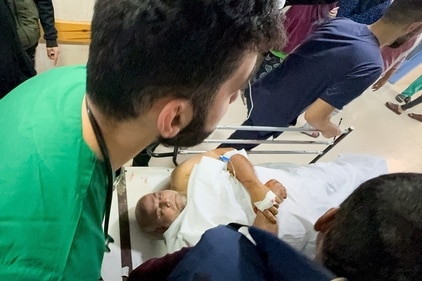 Al Jazeera journalist Wael Al-Dahdouh, who was wounded, lies at Nasser hospital, amid the ongoing conflict between Israel and the Palestinian Islamist group Hamas in Khan Younis in the southern Gaza Strip. (REUTERS)