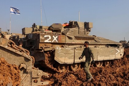 Israeli tanks are deployed in southern Israel near the border with the Gaza Strip on December 15, 2023, amid ongoing battles between Israel and the Palestinian militant group Hamas. (AFP) Israeli tanks are deployed in southern Israel near the border with the Gaza Strip on December 15, 2023, amid ongoing battles between Israel and the Palestinian militant group Hamas. (AFP)